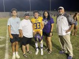 No. 33 Jayden Evangelo with mom Brandy and dad J.D. Evangelo, brother Jax at far left and Tiger Coach Rich Tuman.